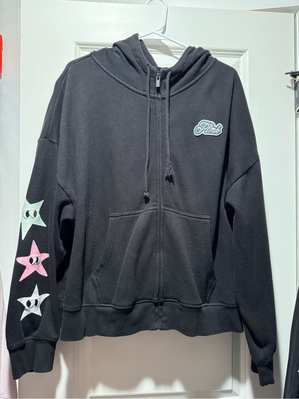 PINK Victoria's Secret Black Zip-Up Hoodie with Pastel Star Details